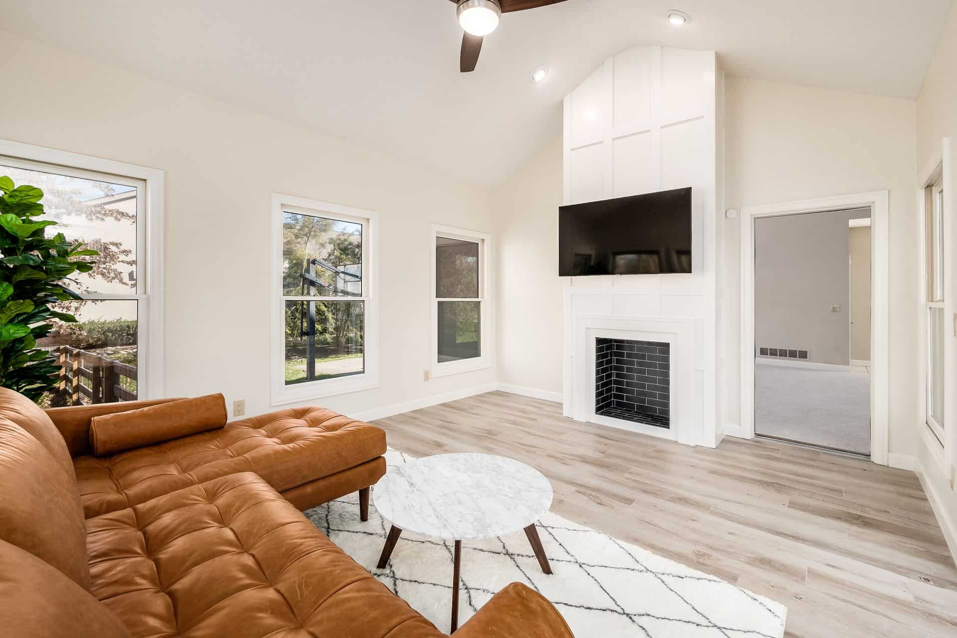 Powell Home Remodeling showing faux fireplace with simple wainscotting 2
